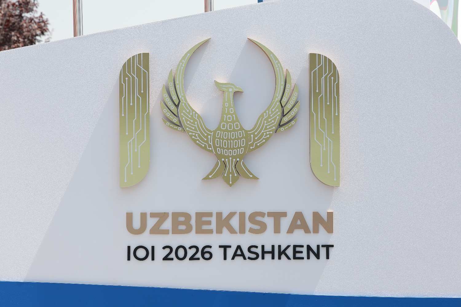 The IOI 2026 Tashkent signage outside the venue
